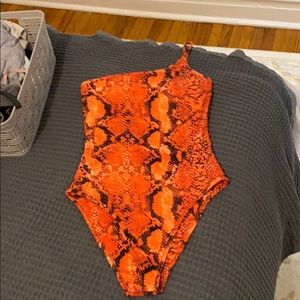Orange snakeskin bodysuit